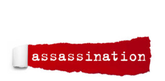 The word 'assassination' printed on a red torn paper background