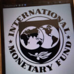 Logo of the International Monetary Fund displayed on a smartphone