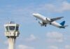 TERRIFYING Moment Caught on Camera — Plane Door Failure An airplane taking off near an airport control tower