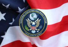 National Counterterrorism Center emblem on an American flag background