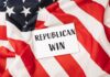 A notepad with the words 'REPUBLICAN WIN' on an American flag background