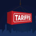 Red shipping container labeled 'TARIFFS' suspended above a city skyline