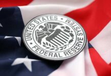 Federal Reserve emblem on an American flag background