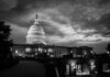 U.S. Capitol building at dusk, black and white photograph.