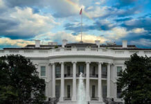 White House SHOOTOUT — Another Security Breach? White House with a rainbow in the sky.