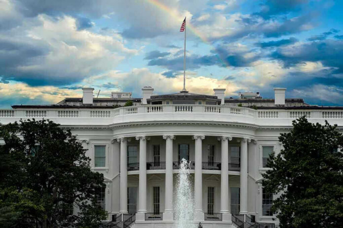 1526063618 White House with a rainbow in the sky.