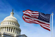 Senators Dock Own Pay — Real Change or Empty Gesture? US Capitol with American flag waving in foreground.