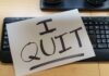 Border Boss Quits: Hidden Power Struggle? A resignation letter reading 'I QUIT' placed on a keyboard