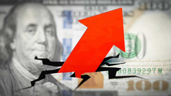 shutterstock_2132991311.jpg Red arrow on cracked $100 bill.