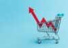 Cookout Costs SKYROCKET – Backyard BBQ Equals Car Payment? A shopping cart with red arrows indicating growth on a blue background