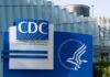 Signage of the CDC building displaying its name and logo