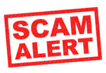 TERRIFYING New Scam Empties Bank Accounts Red stamp with the words SCAM ALERT in bold letters