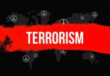 TERROR Plot EXPOSED — Migrant’s Phone Reveals ALL Graphic representation of terrorism with peace symbols and a bold red stripe