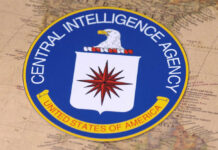 Ex-CIA Spook Busted with $40M Gold Secret Central Intelligence Agency emblem on a world map.