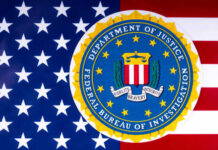Hostages Freed — FBI Kills Suspect FBI seal overlaid on an American flag background