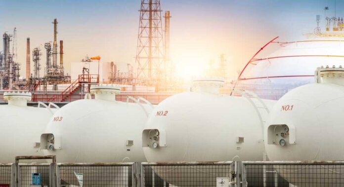 Industrial,Gas,Storage,Tank.,Lng,Or,Liquefied,Natural,Gas,Storage Gas storage tanks in an industrial facility during sunrise