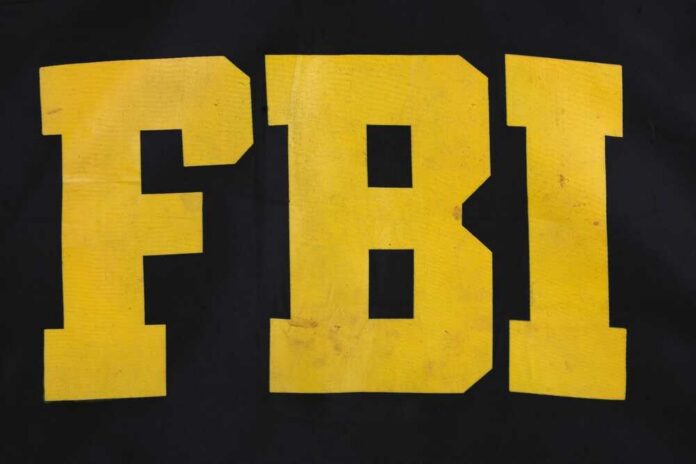 Fbi,Raid,Jacket,Black,Uniform,Background FBI logo displayed in large yellow letters on a black background