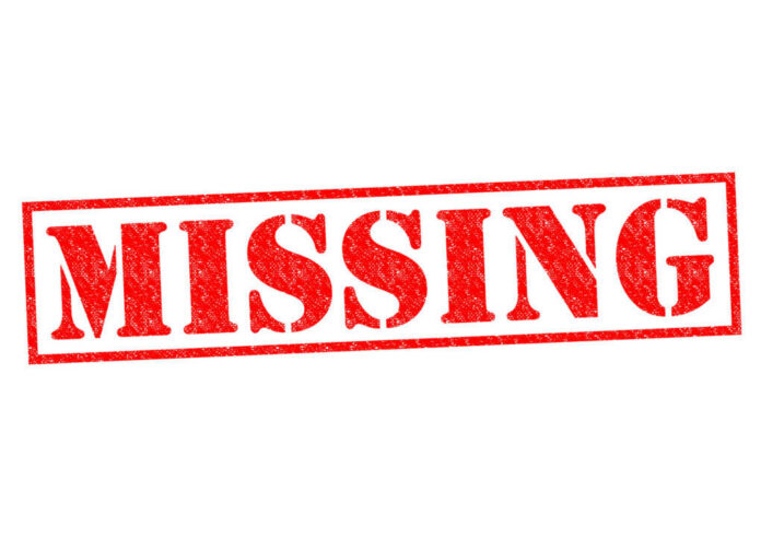 shutterstock_230093158 Red missing stamp on white background