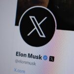 Close-up of a social media profile page featuring a logo and username