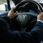 VIDEO: Autopilot Claim, Deadly Crash — What’s Missing? Person driving a Tesla car steering wheel