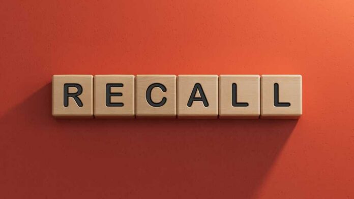 Recall,Written,On,Cubes,On,Wooden,Background.close,Up,Of,Wooden Wooden letter tiles spelling recall on an orange background