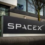 SpaceX sign outside a modern office building