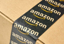 Amazon Item Recalled Over DEADLY Choking Risk Close-up of an Amazon-branded shipping box tape on a cardboard box