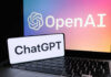 Shocking 50% AI Grab Looms? OpenAI ChatGPT logos on laptop and smartphone screens.