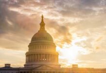Senator’s Silence Shattered — What Happened? The Capitol building in Washington D.C. silhouetted against a sunset