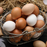 19 Million Eggs Pulled In Shocking Move Basket of brown and white eggs on straw