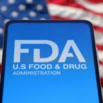FDA Flags Kid-Favorite Pouches — Why? FDA logo displayed on a smartphone with an American flag background