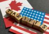 Tariff Smoke Bomb Stuns Ottawa Canada and U.S. flags at an airport.