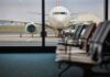 Mid-Atlantic Meltdown Halts AA Dreamliner View of an airplane from an airport waiting area