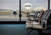 Mid-Atlantic Meltdown Halts AA Dreamliner View of an airplane from an airport waiting area