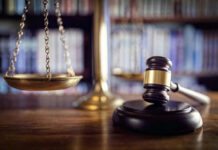 Scales and gavel on a judges desk.