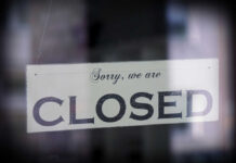 Pet Store Collapse: 75 Closed A sign hanging in a window that reads 'Sorry, we are CLOSED'
