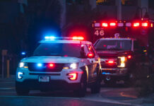 Foul Play Bombshell In Missing Mom Case Police car and ambulance with flashing lights nighttime