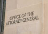 Overnight Stunner: AG Pick Squeaks Through Office of the Attorney General building sign.
