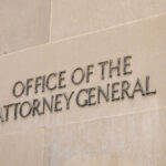 Overnight Stunner: AG Pick Squeaks Through Office of the Attorney General building sign.