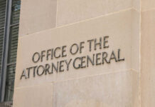 Overnight Stunner: AG Pick Squeaks Through Office of the Attorney General building sign.