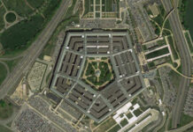 PENTAGON Purge Rattles Military Press Aerial view of the Pentagon building surrounded by roads and parking lots