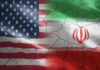 War Windfall Sparks Trump Fury Flags of the United States and Iran blended together with a cracked texture