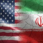 War Windfall Sparks Trump Fury Flags of the United States and Iran blended together with a cracked texture