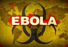 Biohazard symbol over world map referencing Ebola