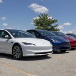 Tesla Alert: 3 Million Recalled A lineup of Tesla electric vehicles parked outdoors under a blue sky