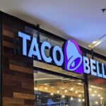 ALERT: Taco Bell Lettuce Nightmare Widens Taco Bell storefront sign with illuminated logo