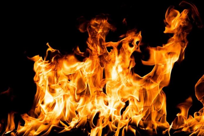 Flame,Fires.,Burn,Lights,On,A,Black,Background.,Fire,Flames Bright orange flames against a black background