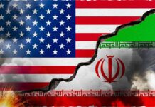 Economic D-Day: Trump Targets Iran’s Lifeline A cracked wall displaying the flags of the USA and Iran, symbolizing conflict