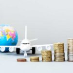 Airline Greed Hits Overhead Space Stacked coins in front of a toy airplane and globe