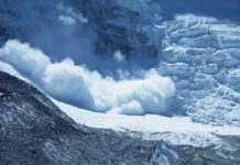 Melting Glacier Spits Out Long-Lost Climbers An avalanche cascading down a glacier in a mountainous region
